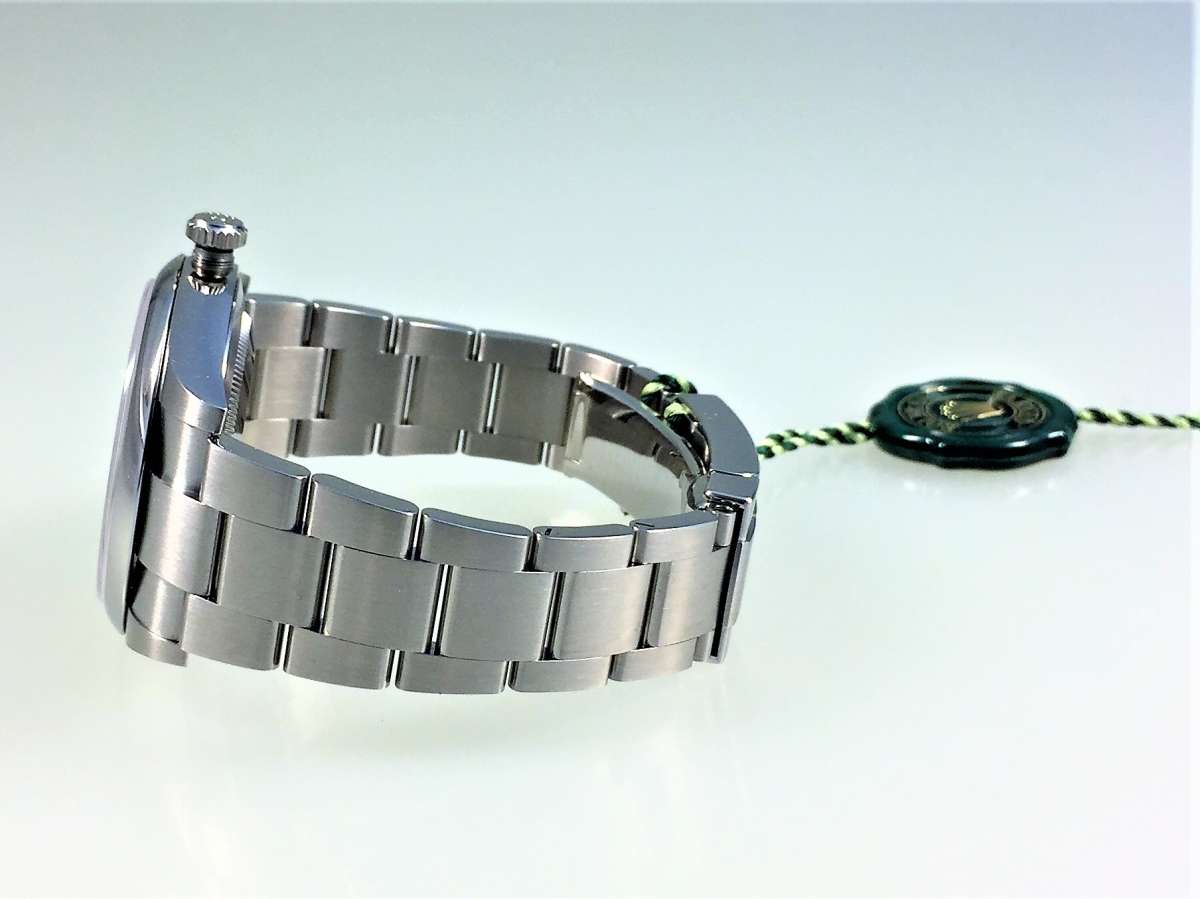 Rolex Oyster Perpetual 41, Ref. 124300, ZB Grün / green dial 
