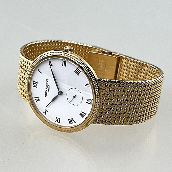 PATEK PHILIPPE CALATRAVA, Ref. 3919J/005, Gehäuse Gelbgold 18 Kt., 33 mm, Meshband Gelbgold 18 Kt.,